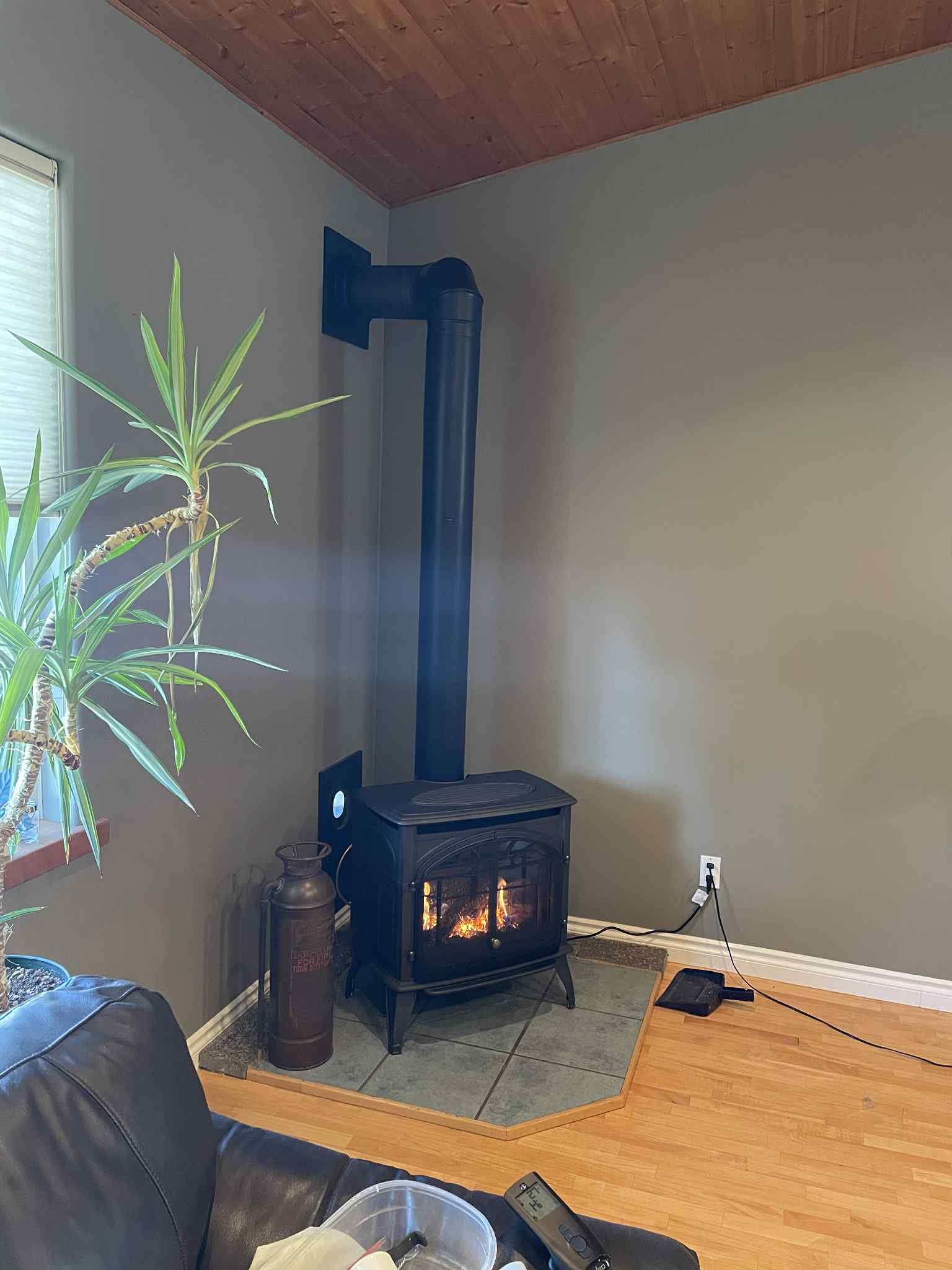 Freestanding gas stove on a tile hearth