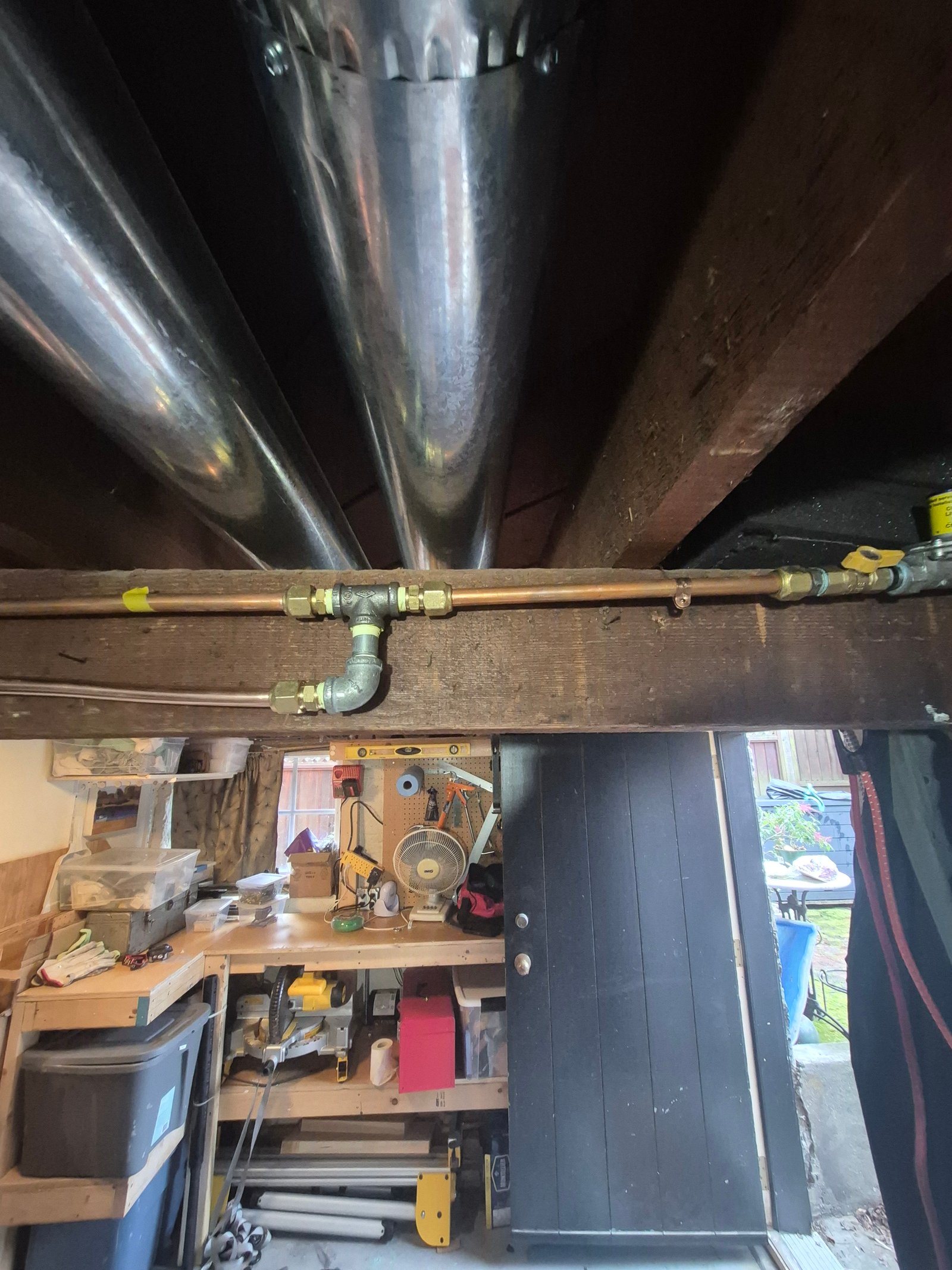 Gas line rough-in along a ceiling joist