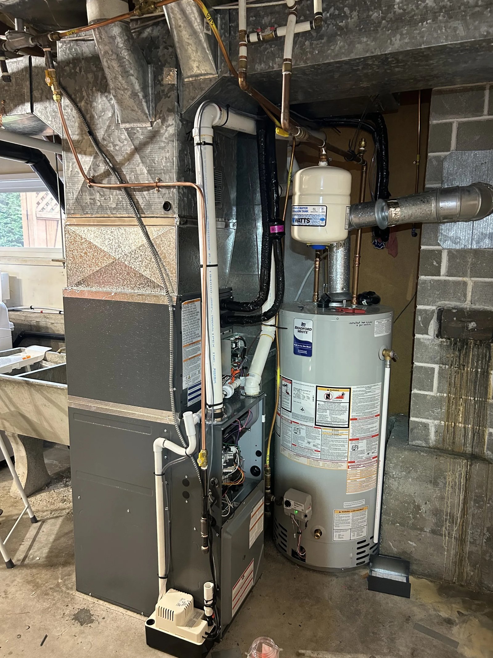 Gas hot water tank installed with venting and copper connections
